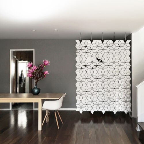 Separatore per ingresso Facet in una residenza contemporanea a Calabasas, che crea una separazione sottile tra ingresso e zona living, preservando luce e apertura.