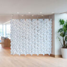Pale Blue Facet hanging room divider with brushed stainless steel suspension in a modern interior