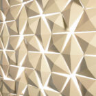 Facet room divider panel in Beige with adjustable geometric modules creating a soft play of light and shadow